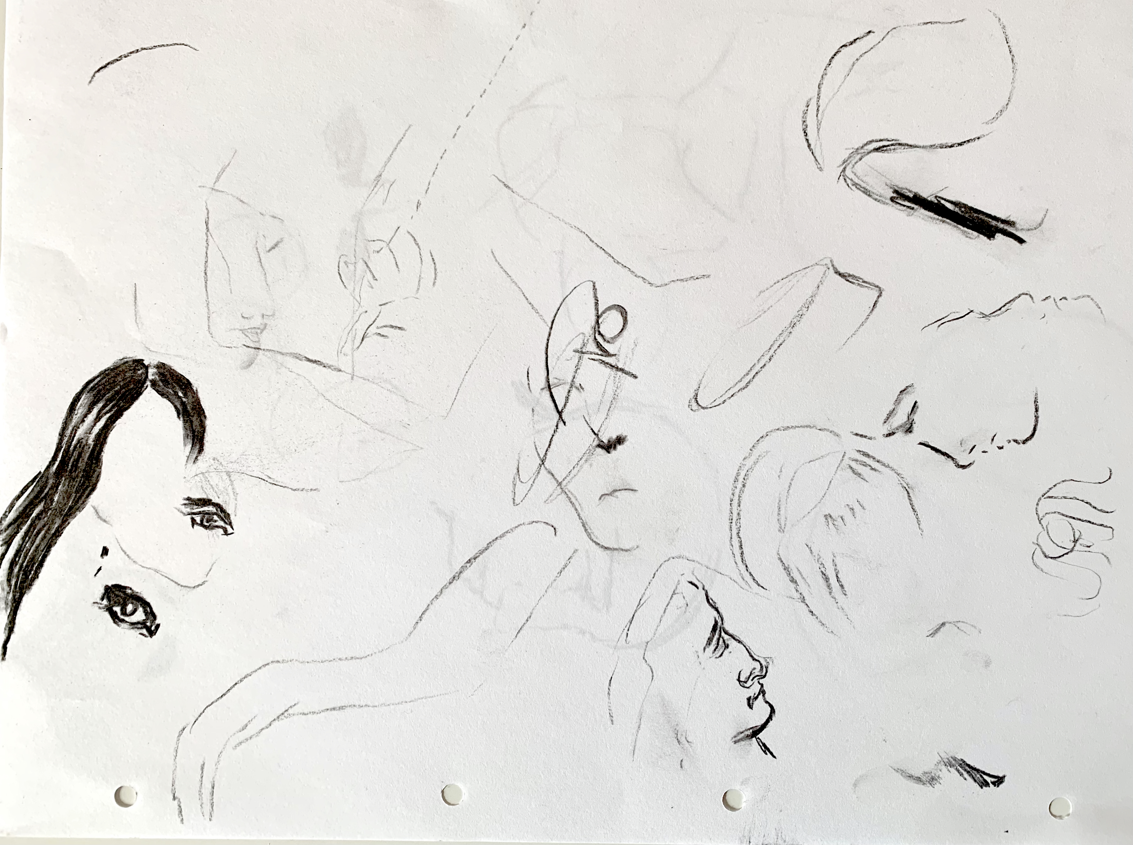 Charcoal sketch of different body parts, eyes, hair, arms, mixed with lines and strokes